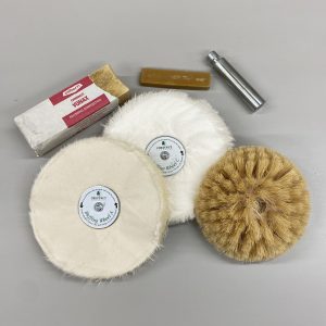 Buffing equipment laid out on a bench